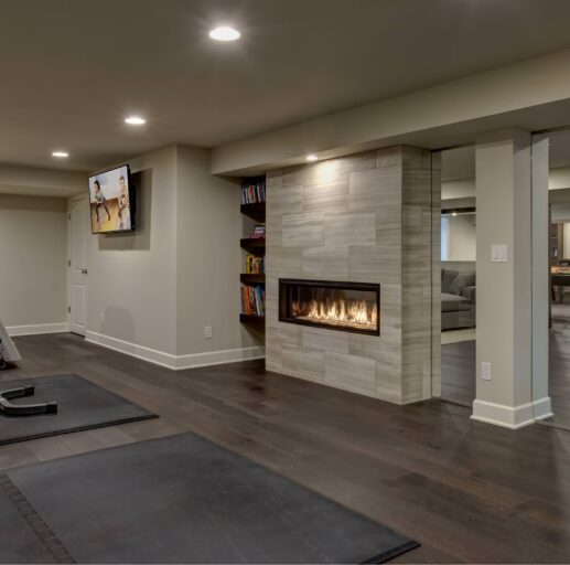 basement-gym-with-fireplace-fbc-remodel-img~57d11659073de0cd_14-0734-1-41bbe64